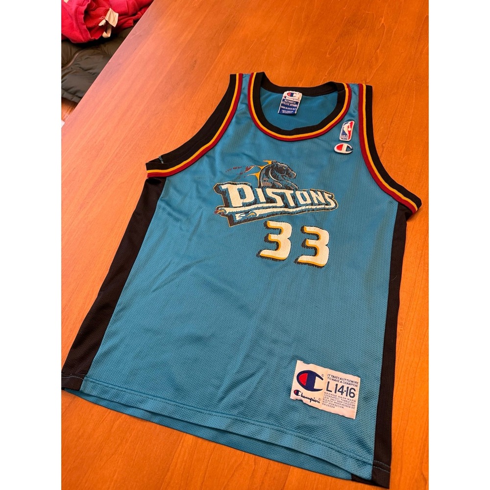 Vintage champion Grant Hill jersey.  Kids large
